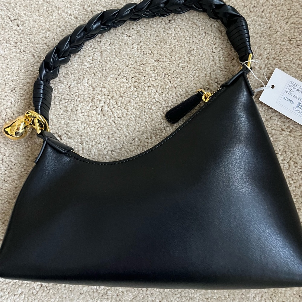 The bag all over the internet because Taylor Swift & other celebrities wear